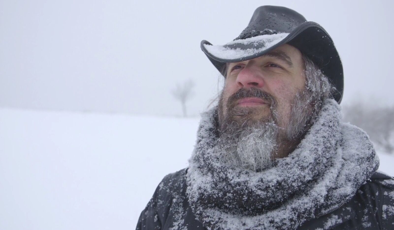 Jason VandenBerghe on a hike through snowy fields toward the end of the documentary.